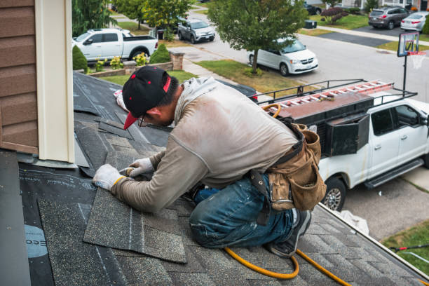 Professional Flat Roof Repair technician working in Munson, PA